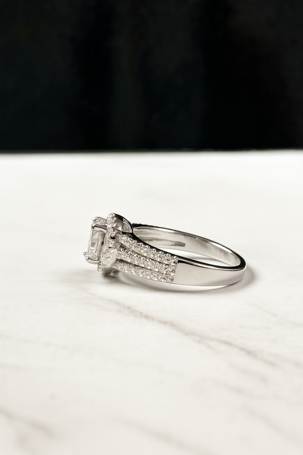 Cora engagement ring with moissanite stones side view