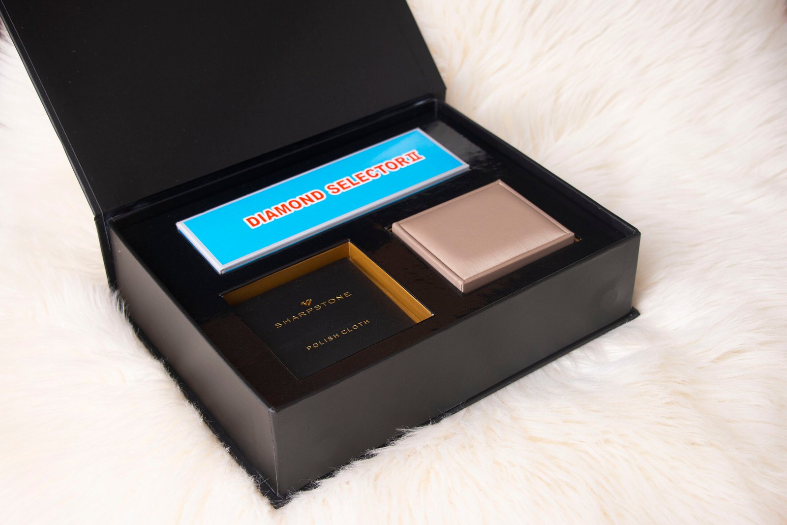 Bridal set rings packaging on white fur surface