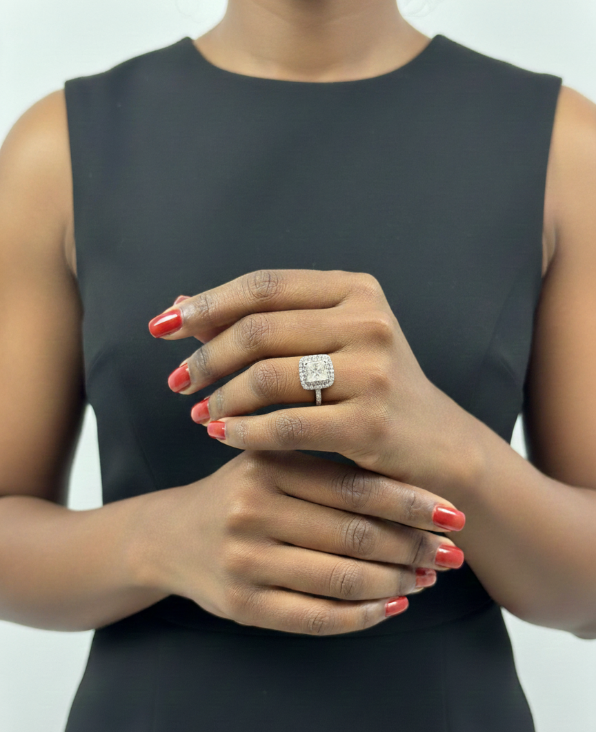 Quinn white engagement ring with moissanite stones model view.png