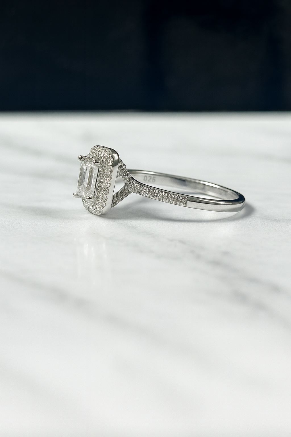 Quinn white engagement ring with moissanite stones side view